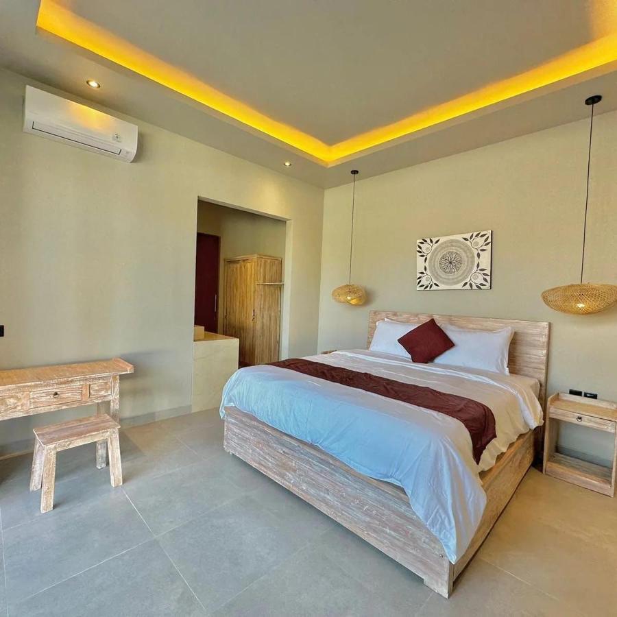 Mega Canggu Guest House Esterno foto