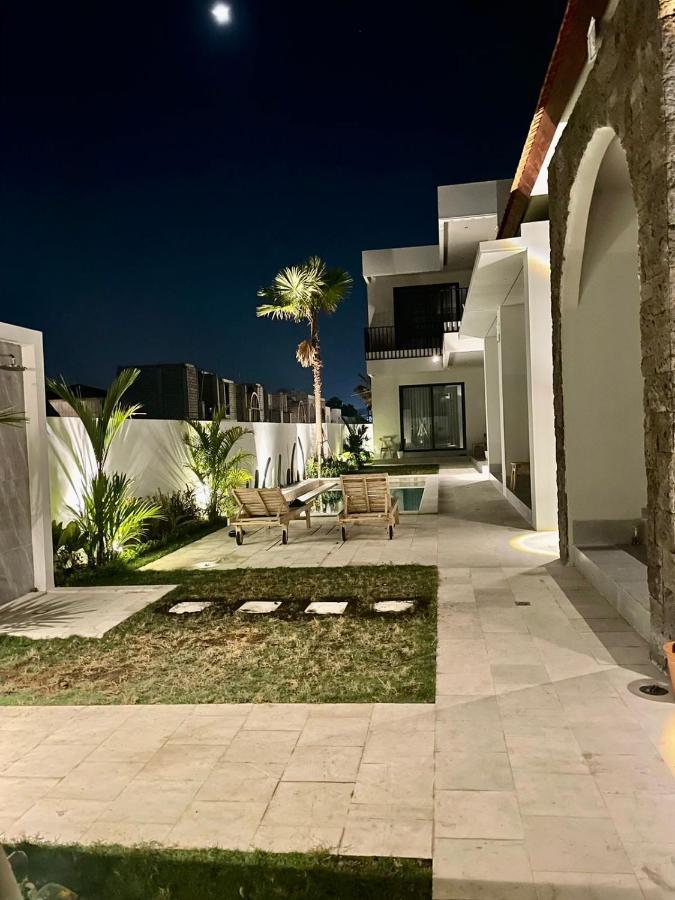 Mega Canggu Guest House Esterno foto