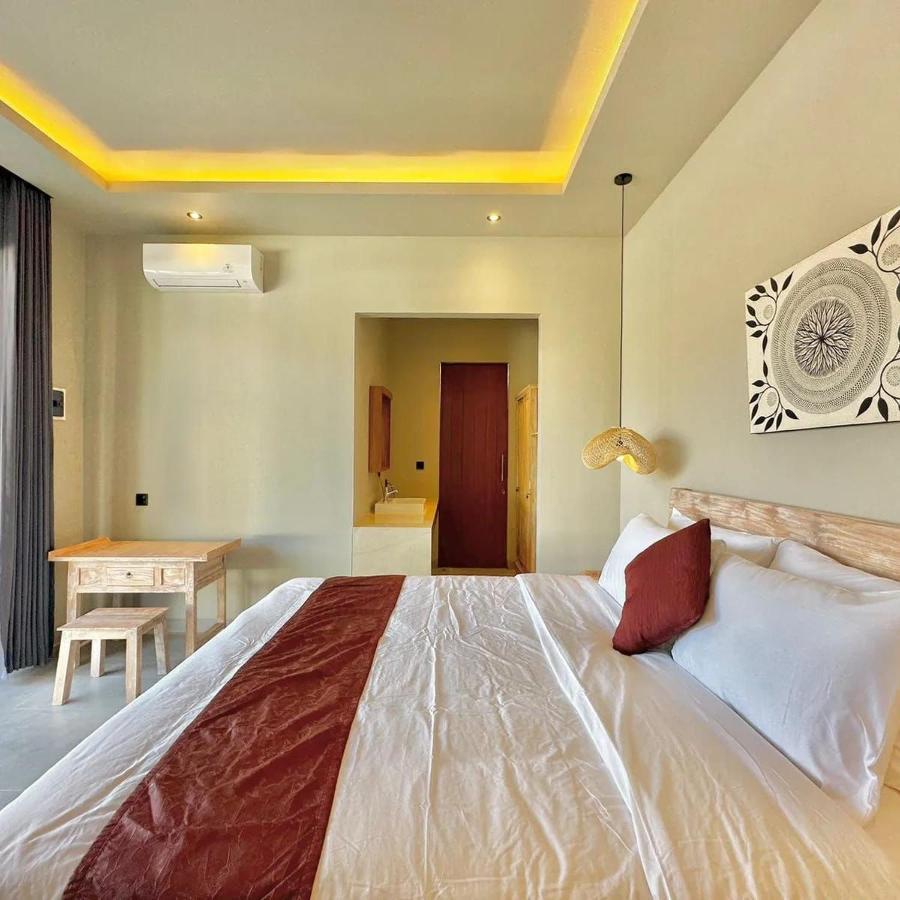 Mega Canggu Guest House Esterno foto